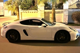 Porsche
              718